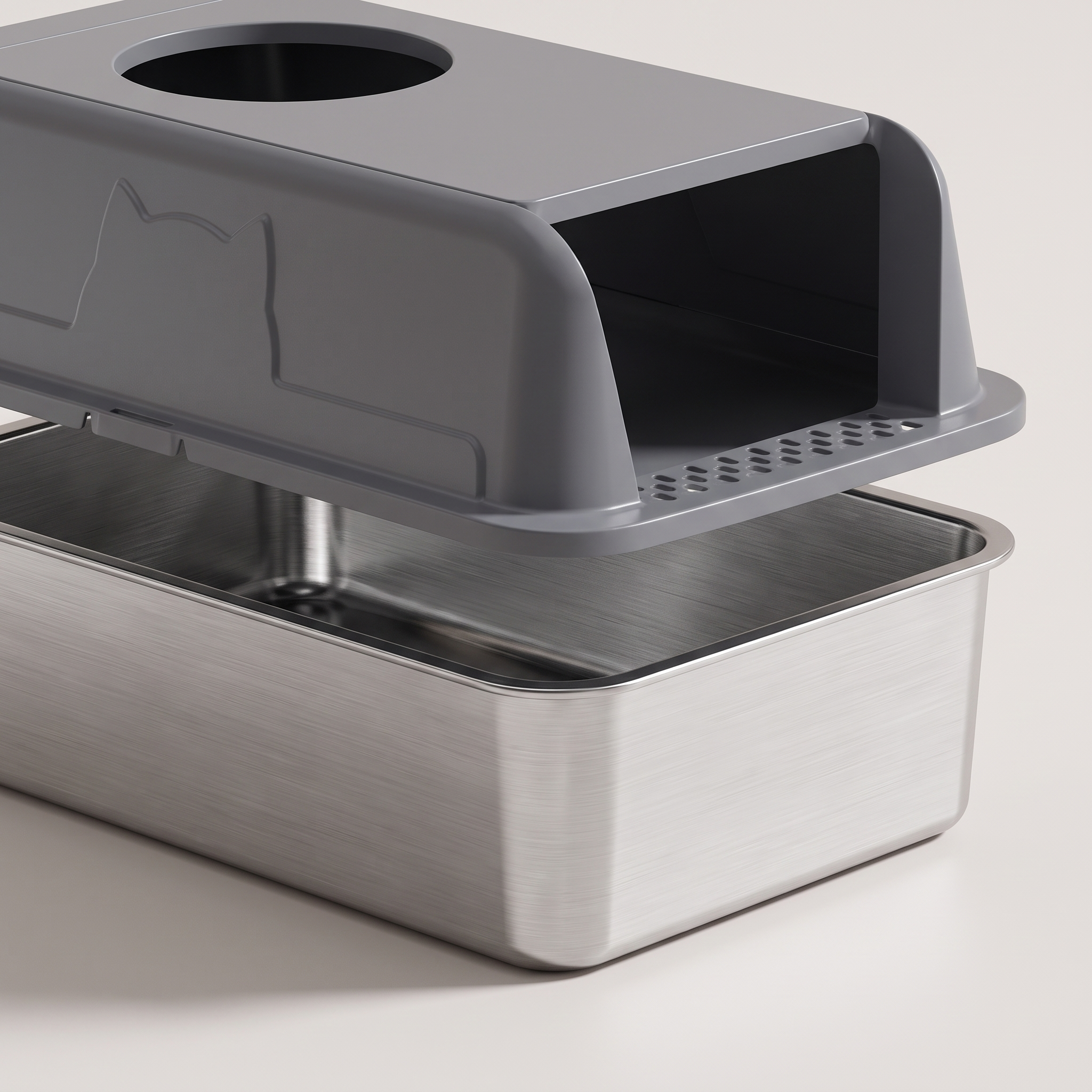Close view of the brushed stainless steel base with the lid lifted