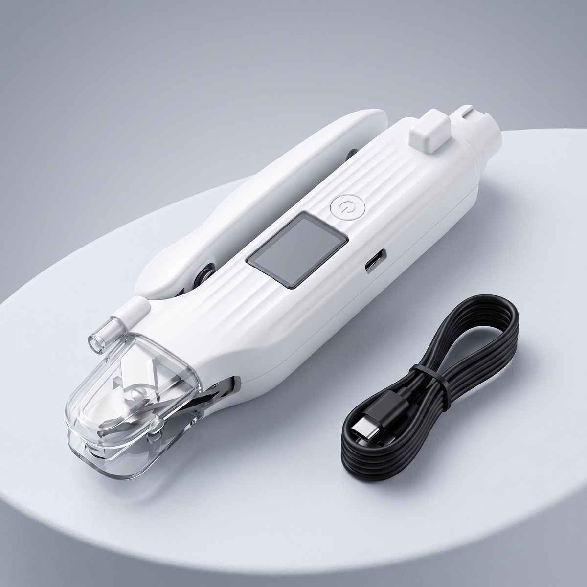 Close product view of the pet nail grinder with its USB charging cable