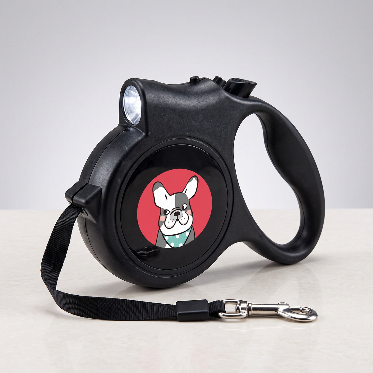 Close product view of the retractable lead housing, brake button and clip