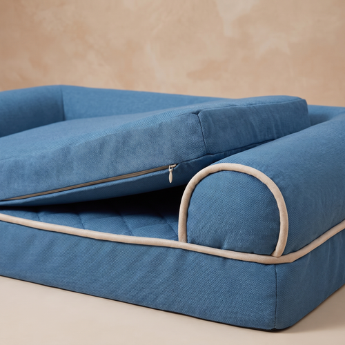 Close detail of the bolster edge and removable cover of the pet bed