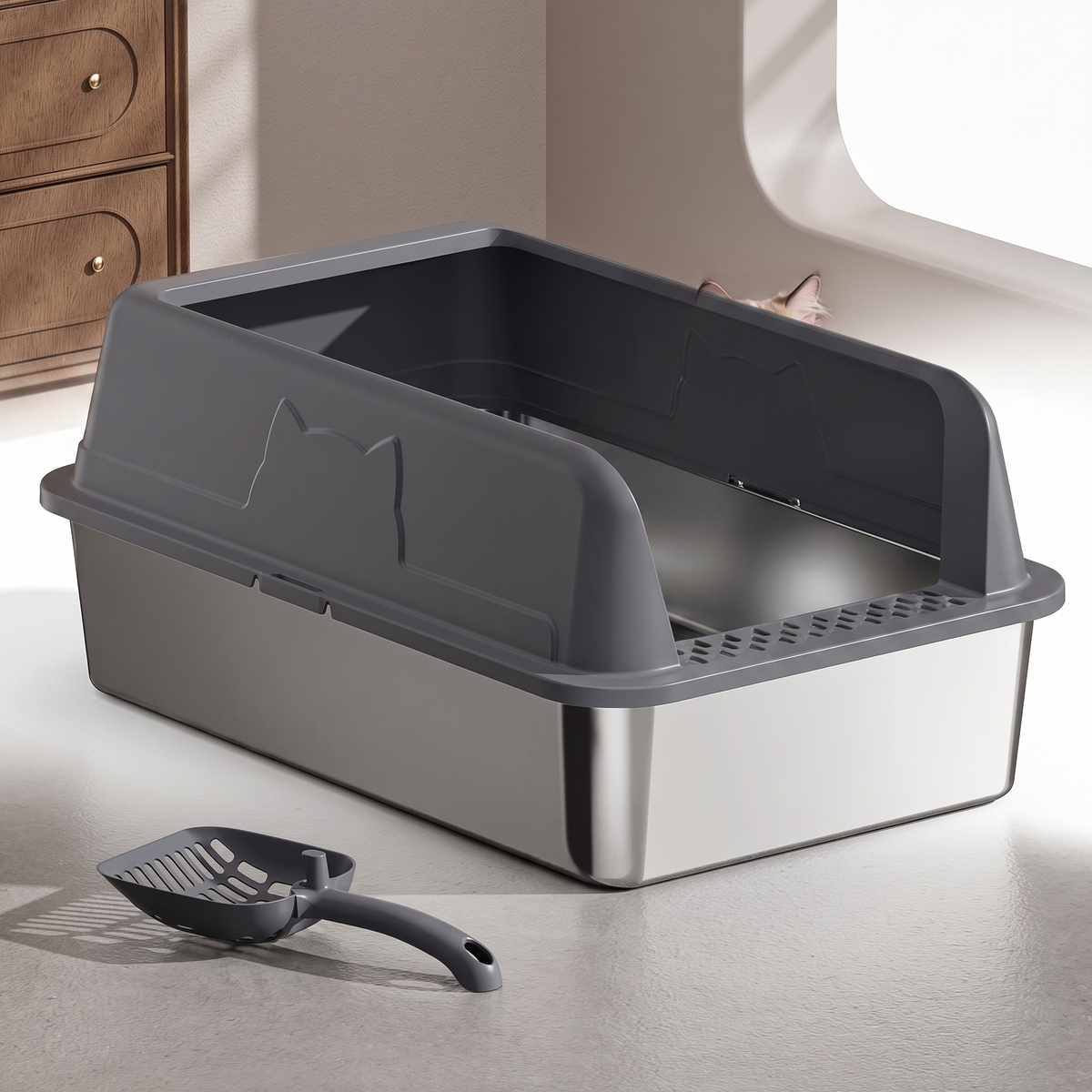 Stainless steel top entry cat litter box on a white studio background