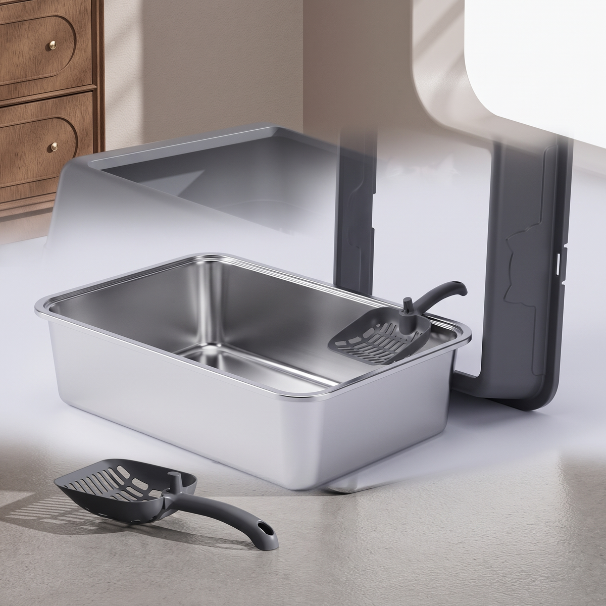 The litter box with the lid removed showing the steel base and included scoop