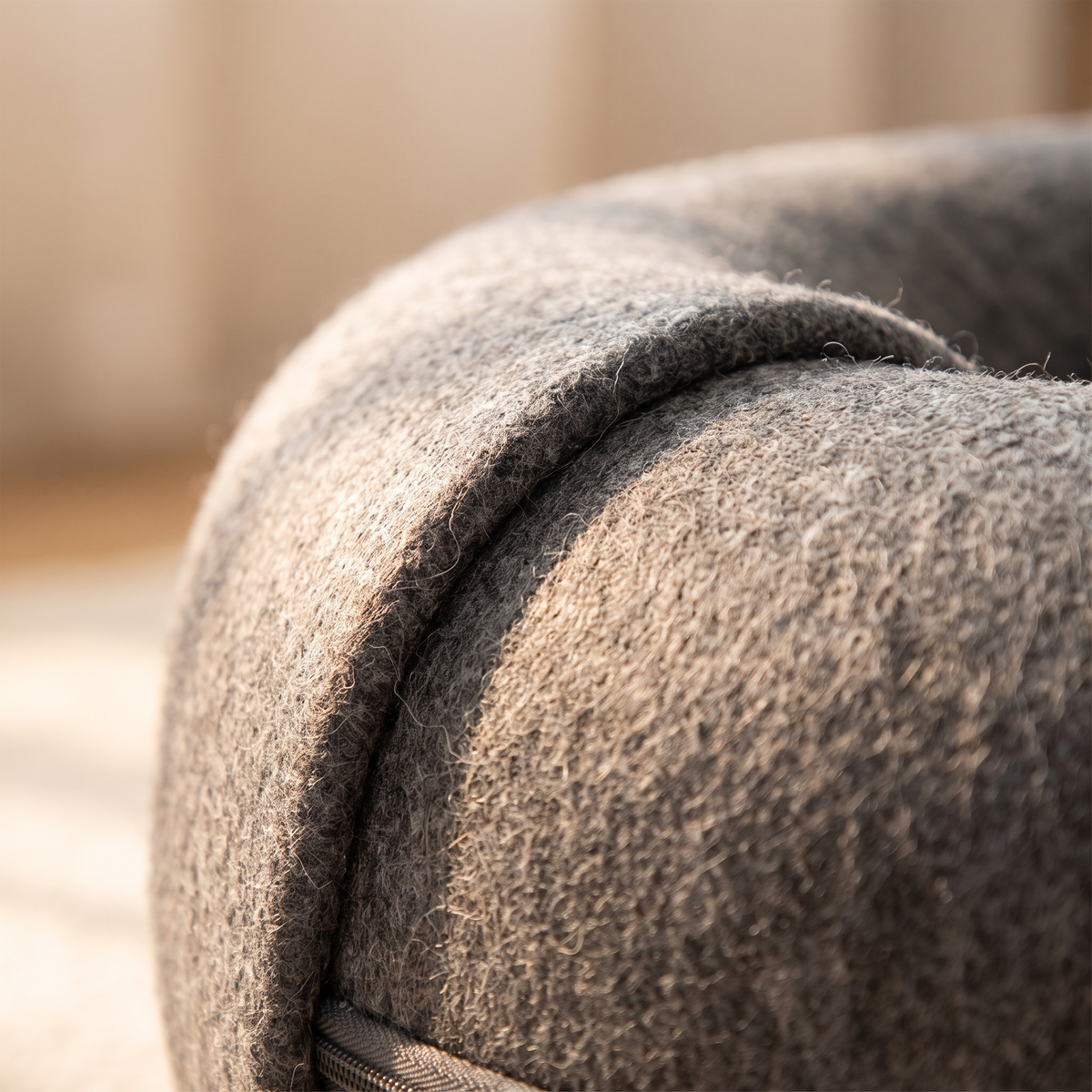 Close view of the pressed felt texture and thickness of the rolled rim