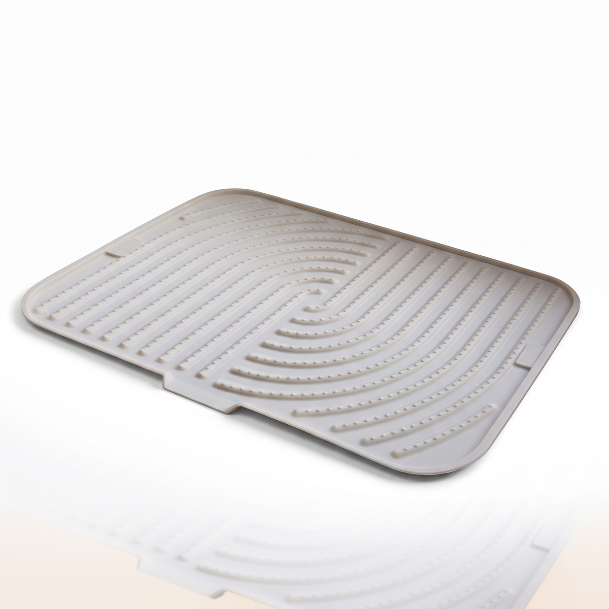 Silicone cat litter mat on a white studio background