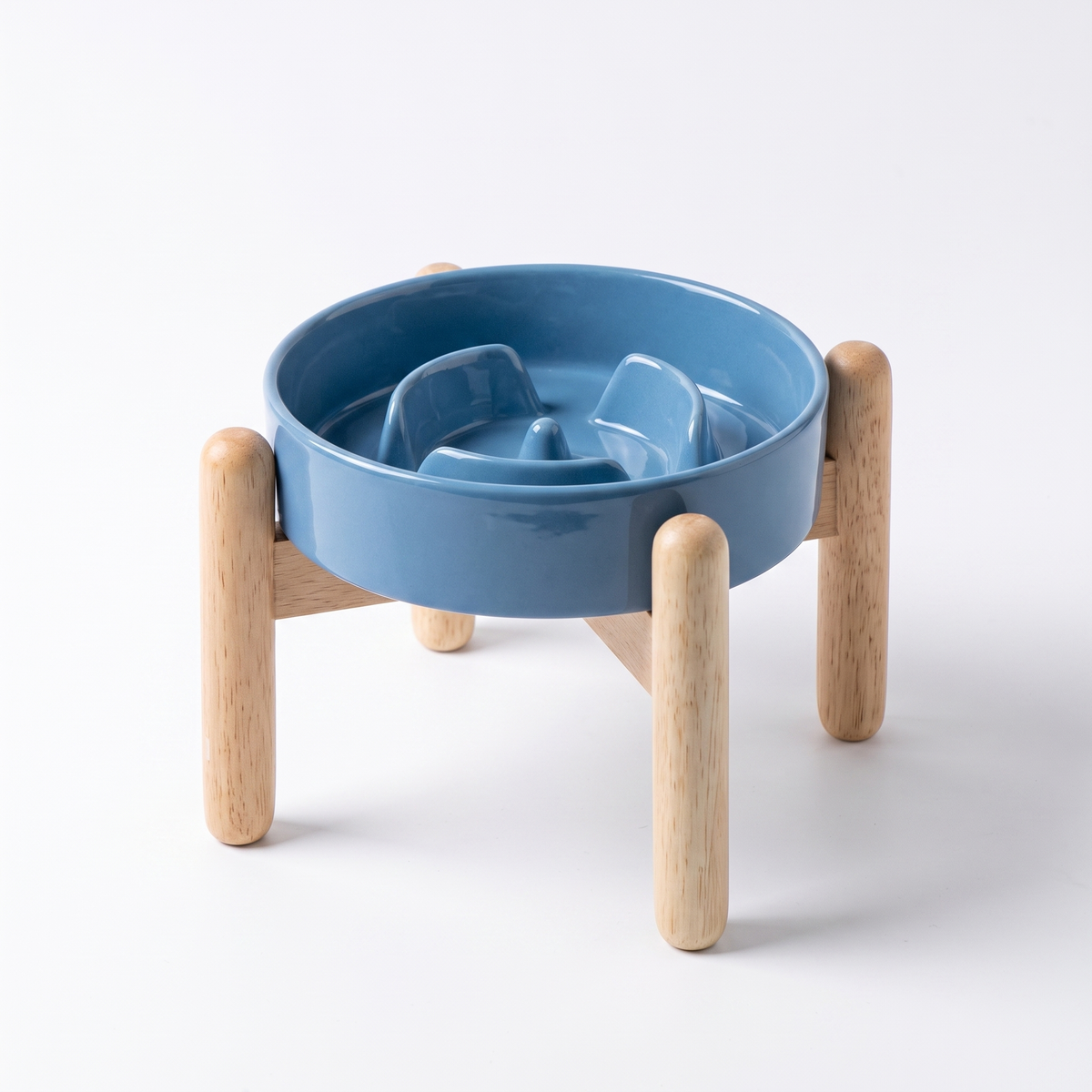Ceramic pet bowl on a white studio background