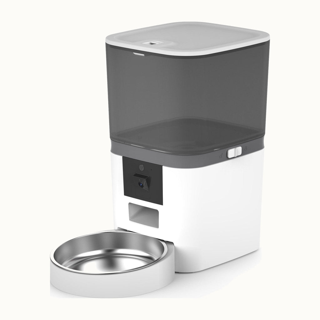 Kitty Korners automatic cat feeder in white, three-quarter view showing the camera and dispensing chute